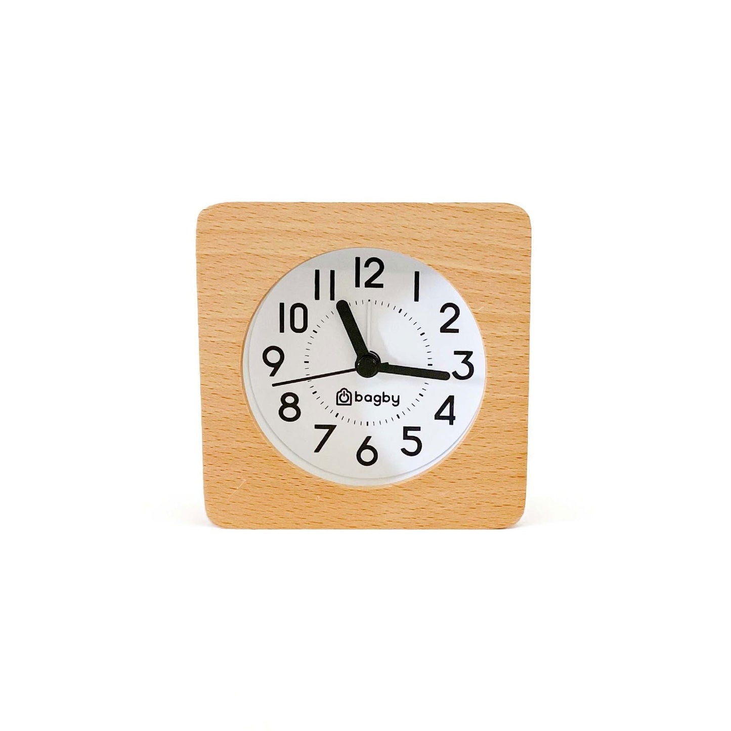 Bagby CLASSIC Silent Alarm Clock on wooden nightstand next to bed in bedroom setting