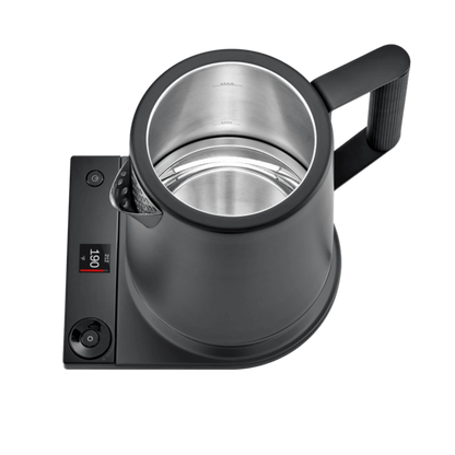 Close-up of SAKI Luna kettle LCD display showing 200°F temperature setting and timer