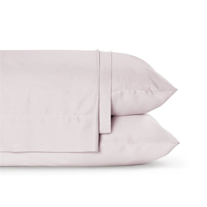 Pure Fiber sheet set pillowcases and flat sheet displaying color options and fabric drape