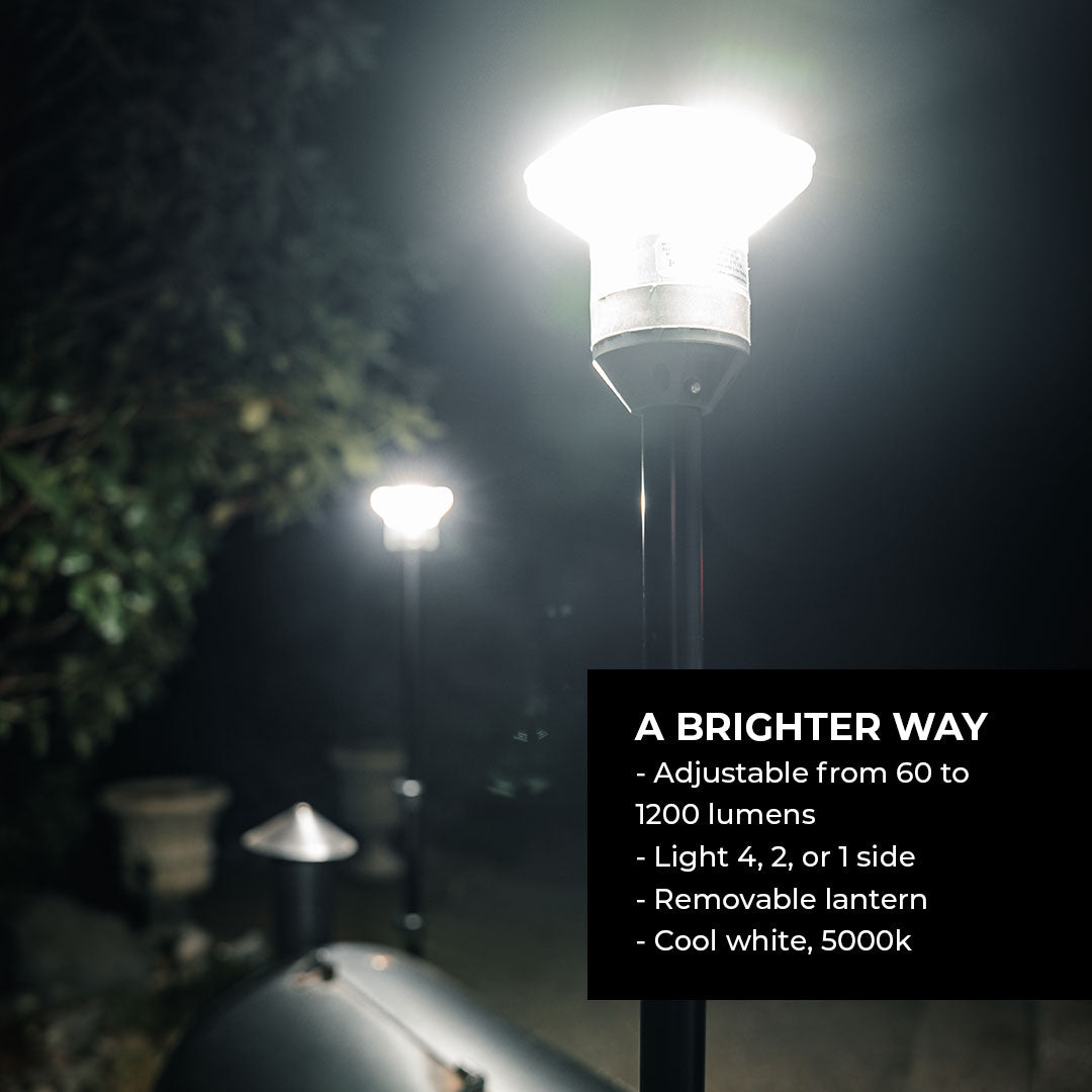 LightRanger 1200 hanging from hook at campsite providing area lighting for outdoor cooking