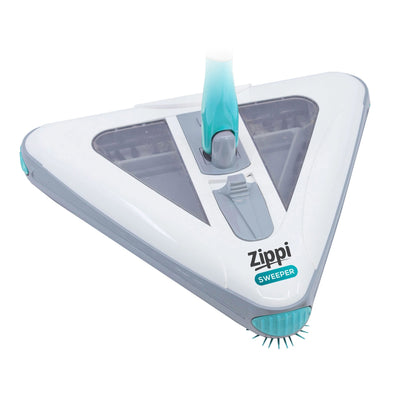 Close-up of Zippi Sweeper low-profile head sliding under furniture